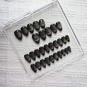 Charmeenail black cat eye press on nails with gold shimmer