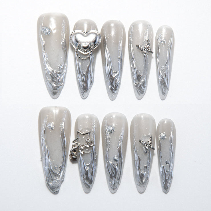 Silver 3D swirl press-on nails with rhinestones and star charms