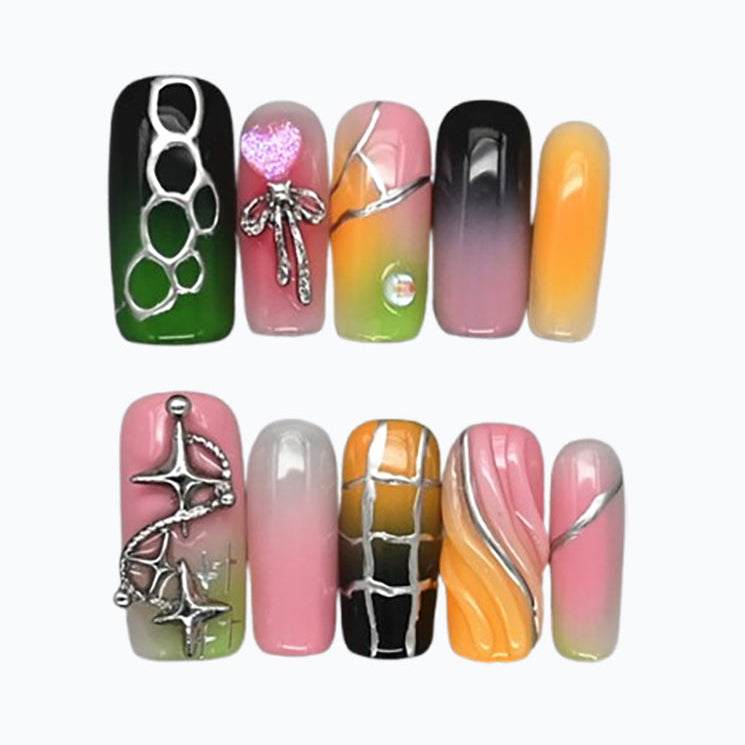Long square press-on nails with green, pink, black and orange gradient and silver 3D line art