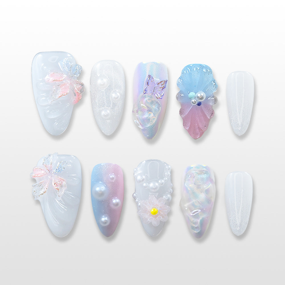 Mermaid-inspired press-on nails with 3D seashell and pearl details