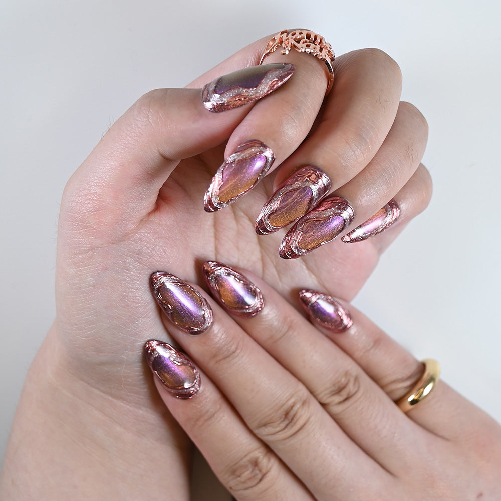 Iridescent purple-copper gradient press-on nails with molten metal-inspired edges