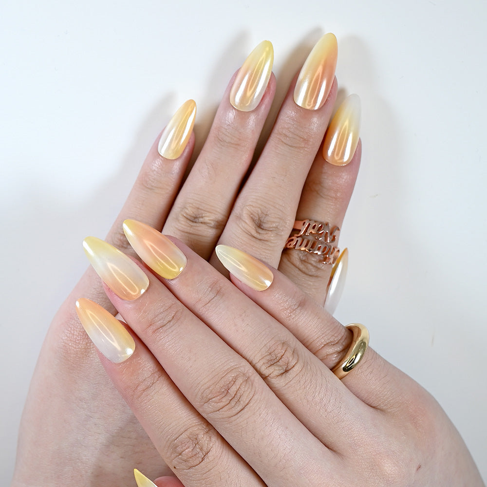Summer-inspired press-on nails with smooth yellow to white fade