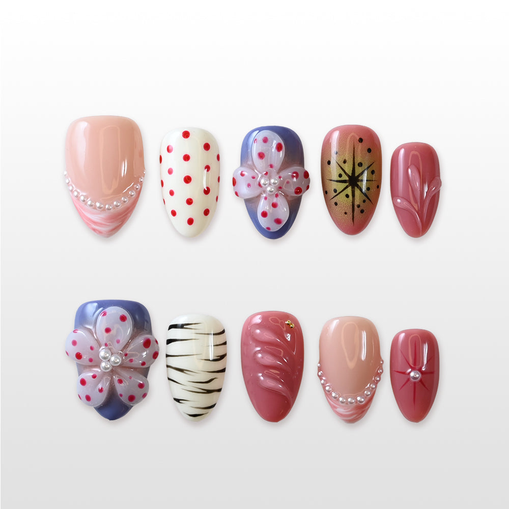 Glossy almond nails with red dots, floral art and gradient tips