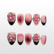  Charmeenail romantic pink nails featuring sculpted flowers, black French tips and ombre base