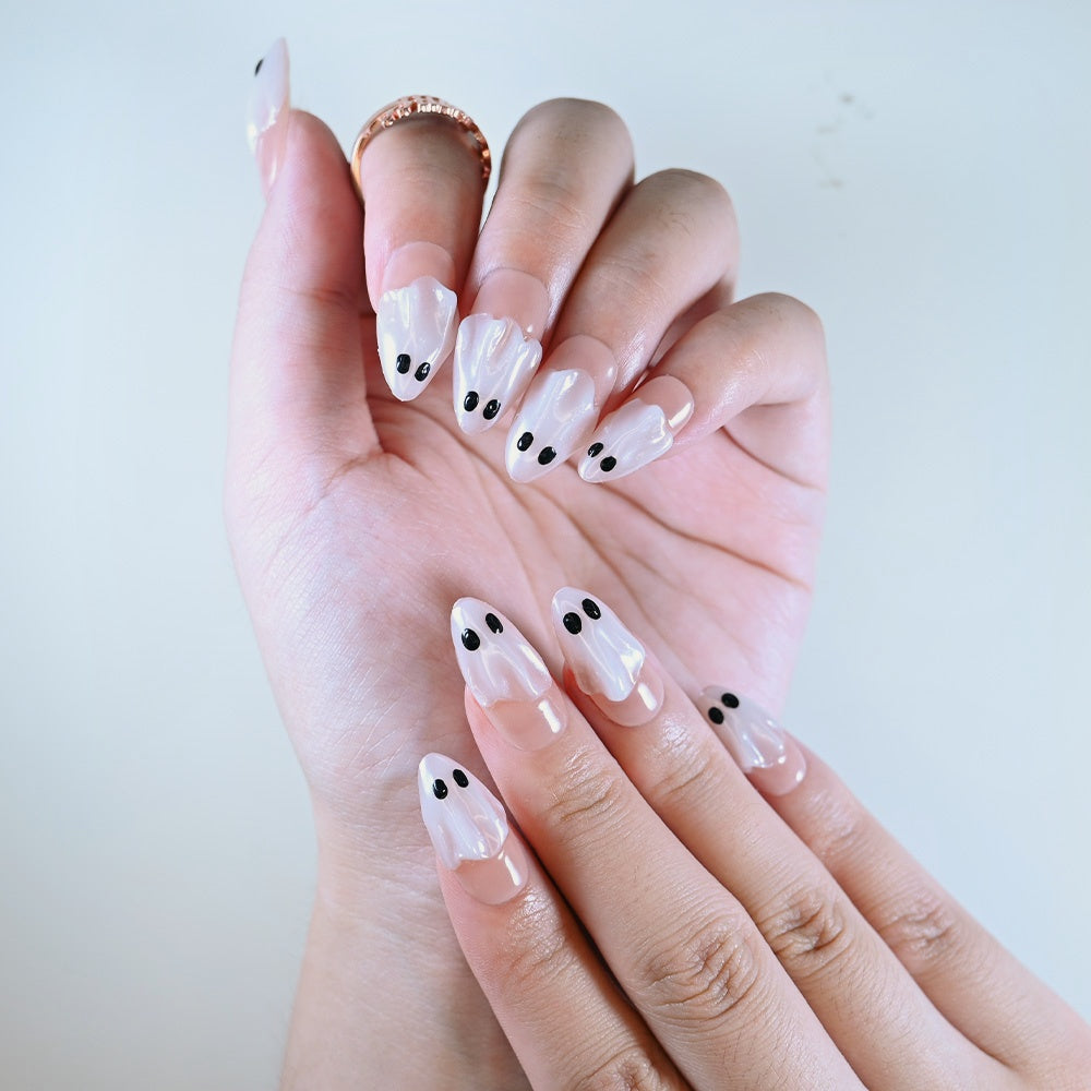 Reusable medium almond acrylic nails by Charmeenail, spooky ghost style with glossy finish